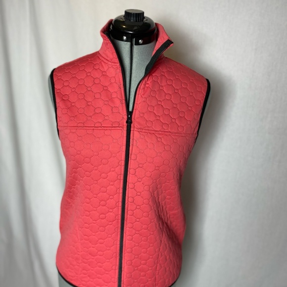 Swing Golf Vest in coral. - Picture 9 of 11